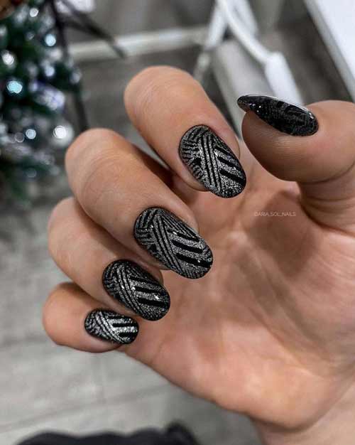 On a black silver cat and stamping