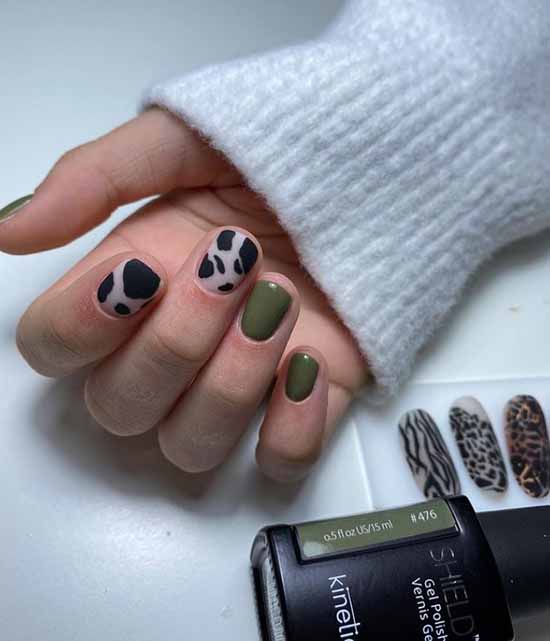 Khaki manicure with a predatory print