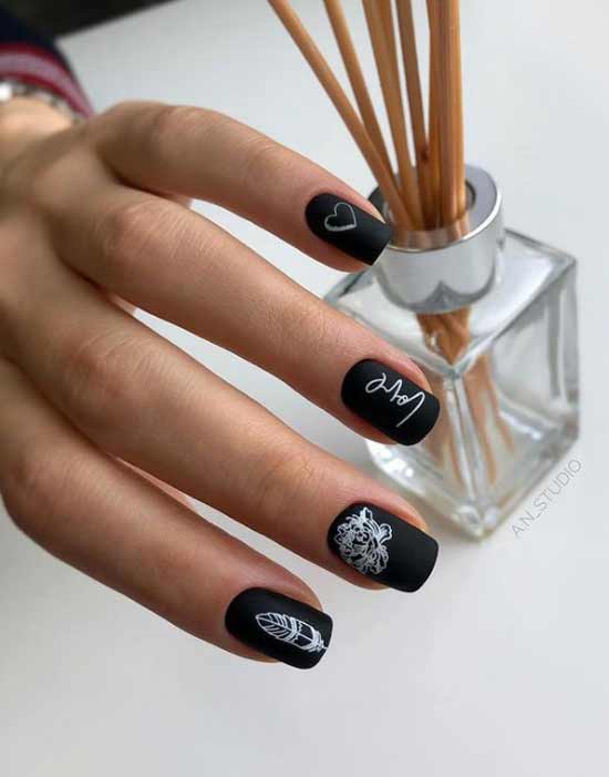 Black manicure with a heart