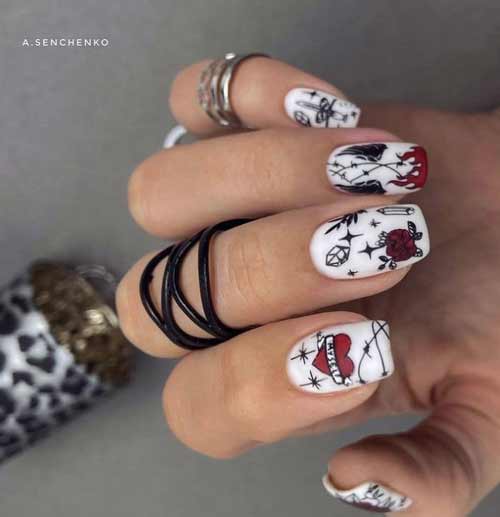 Daring manicure with a red heart