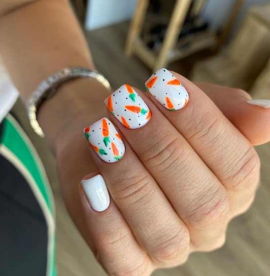 Orange carrots on nails