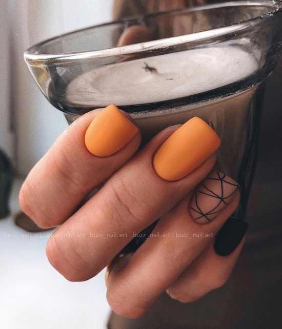 Ongles orange avec du noir