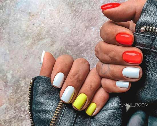 Multicolored neon manicure in orange tones