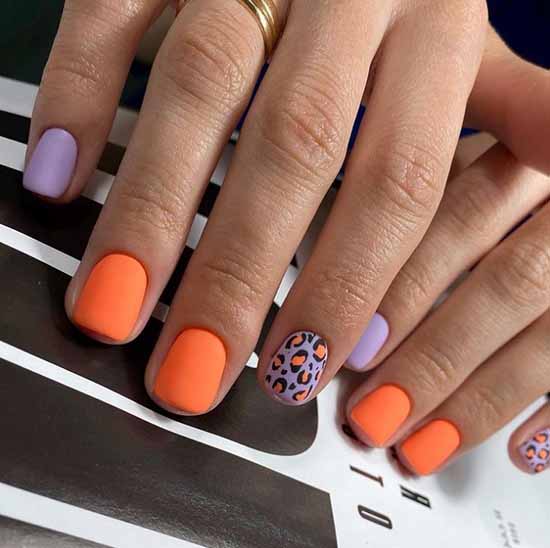 Orange with purple manicure