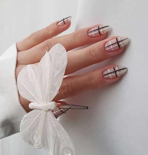 Brown and white cage in manicure trend