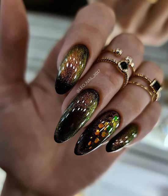 Green manicure cat eye design