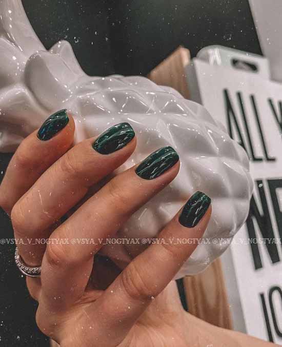 Dark green manicure