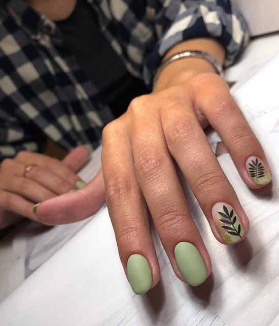 Twig on green nails