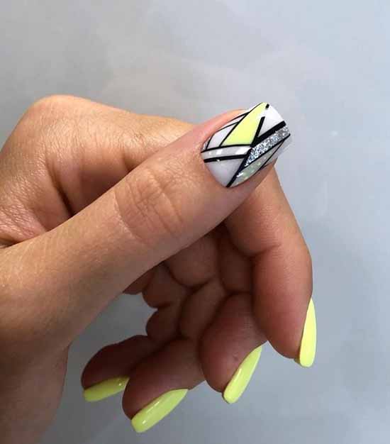 Geometric design in yellow manicure