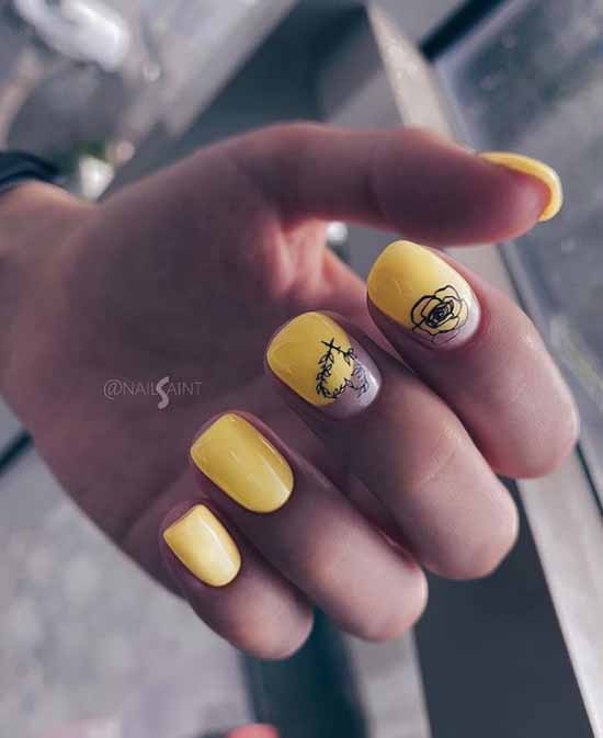 Manucure jaune avec fleur noire