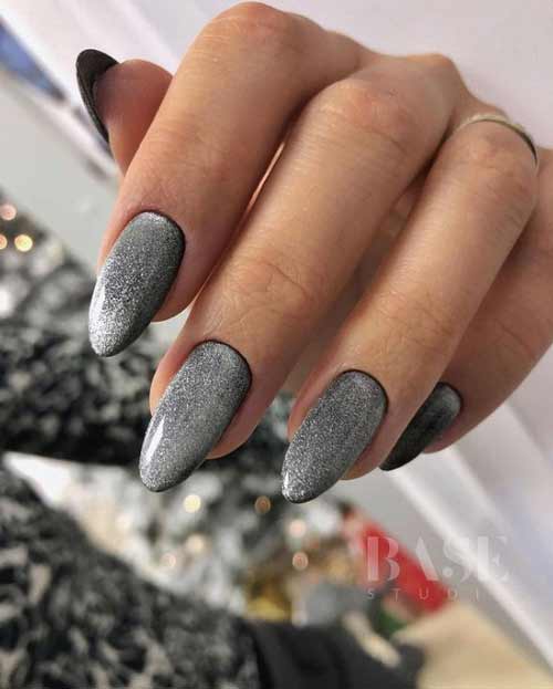 Silver cat on black gel polish