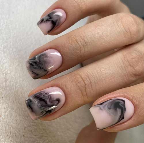 Beaux dessins d'ongles en marbre