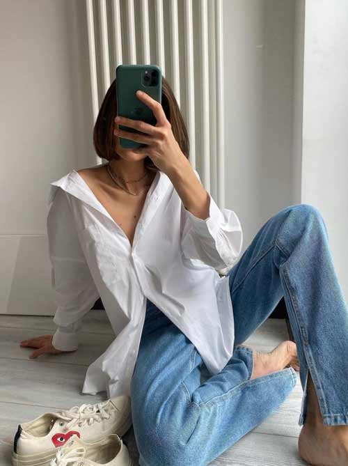 Wide leg jeans with slits and white shirt