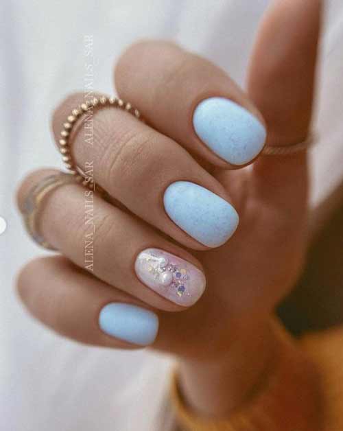 Blue manicure with designs