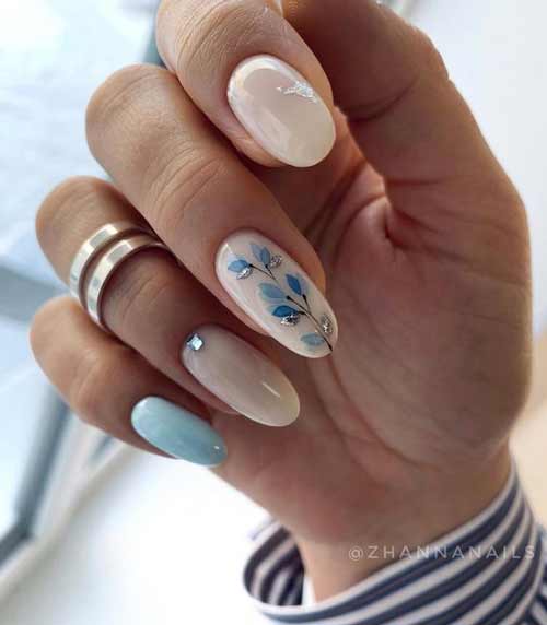 Delicate spring manicure in blue tones