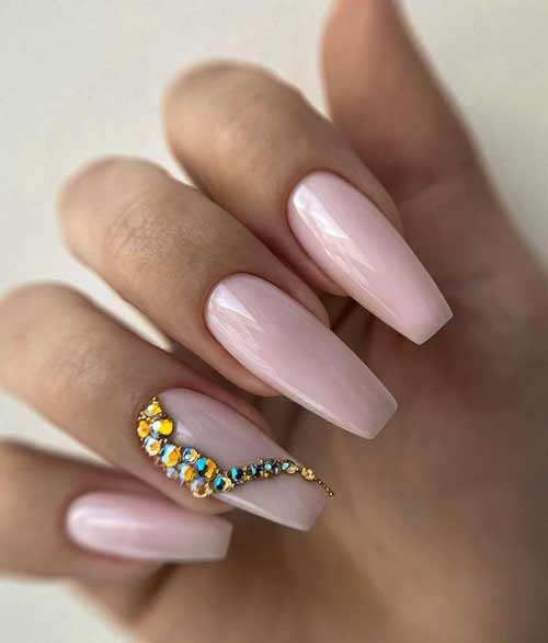 Nude manicure with rhinestones