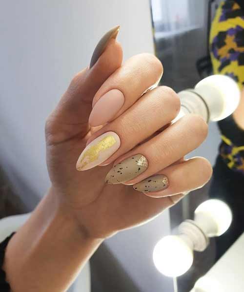 Beige manicure with foil