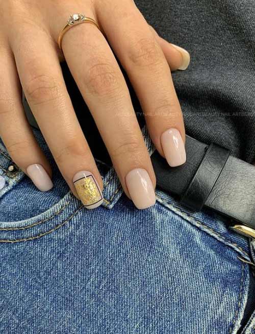 Nude manicure with gold leaf