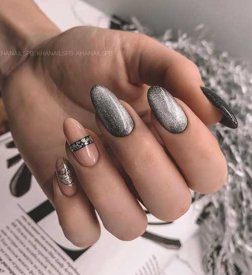 Cat's eye manicure in gray tones