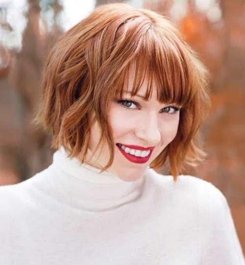 Red bob with torn bangs