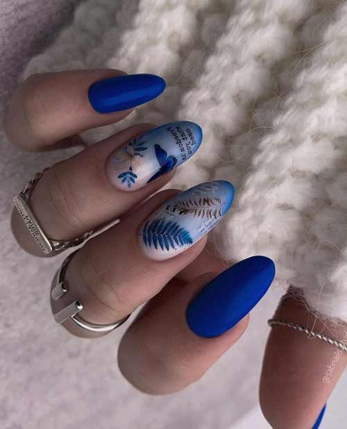 Papillon bleu sur les ongles