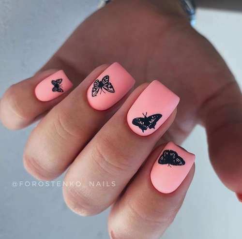 Pink manicure with butterfly