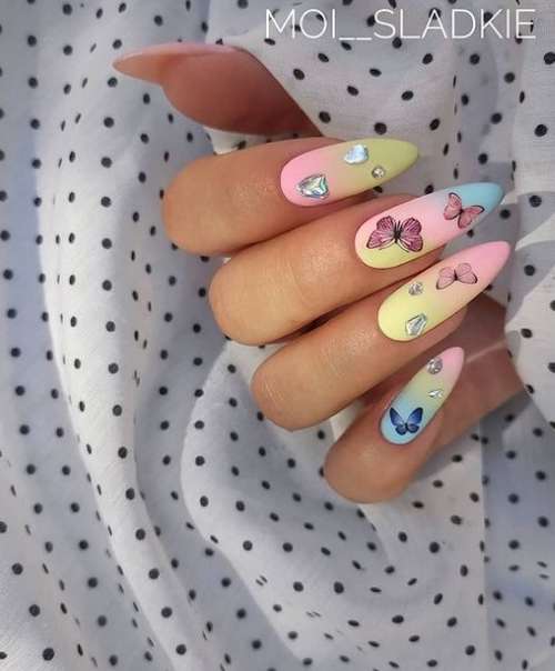 Delicate manicure with butterflies