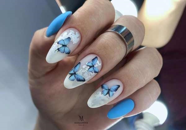 Beautiful manicure with butterflies