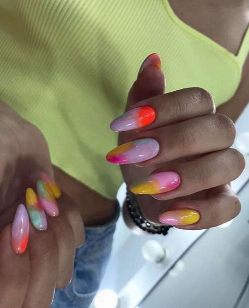 Multi-colored manicure with a pink tone