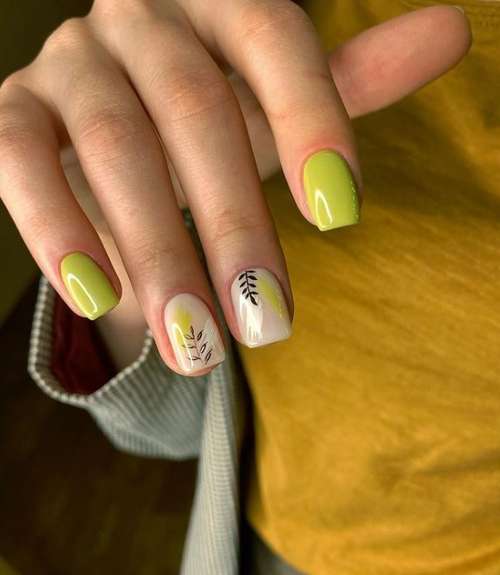 Green manicure with a twig