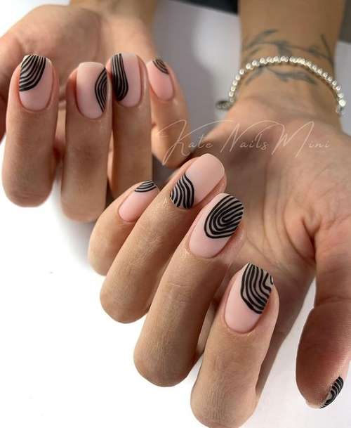 Beige manicure with black