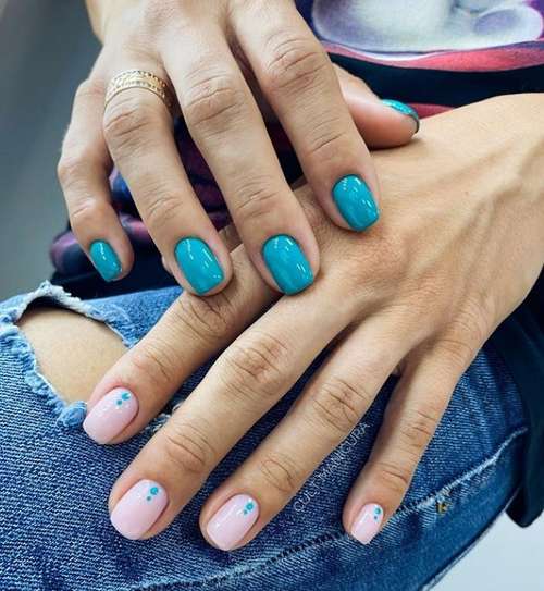 Turquoise manicure different hands