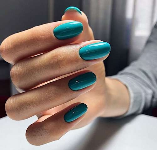 Plain turquoise manicure photo