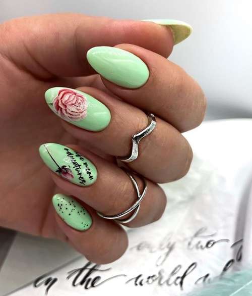 Green manicure with dots