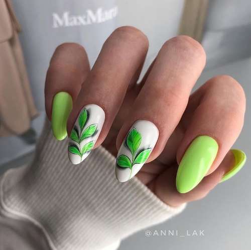 Manicure with green leaves