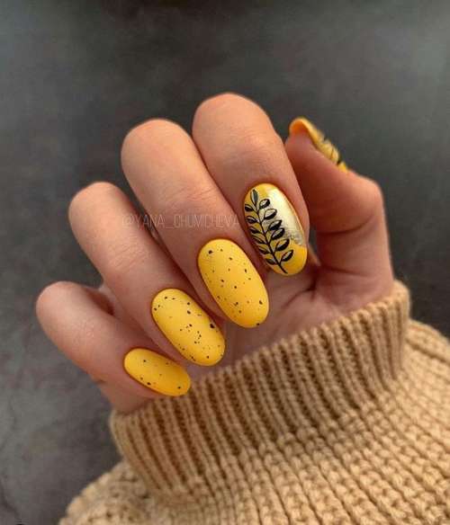 Yellow manicure with gold