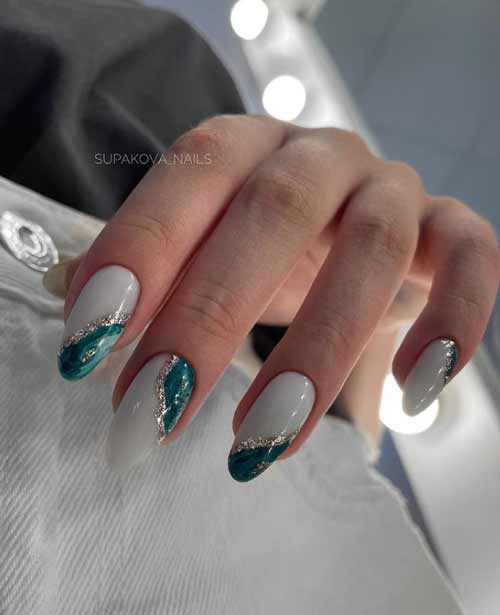 Dark green almond-shaped manicure