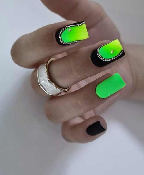 Black neon green and gold manicure