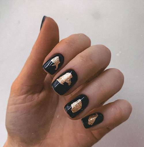 Short black and gold manicure