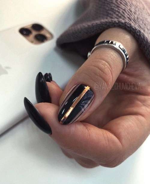 Black manicure with foil