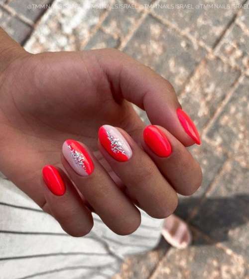 Red manicure with silver foil