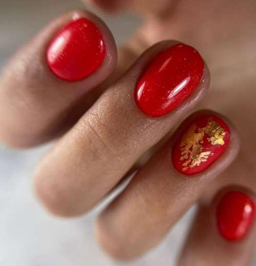 Solid red manicure with foil