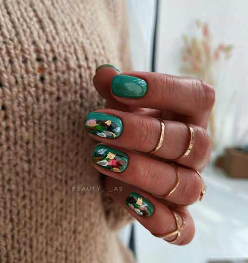 Green manicure with multicolored brush strokes