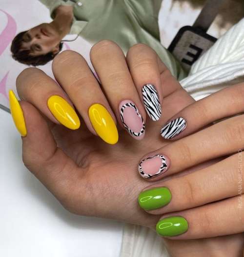 Manicure design different hands and zebra