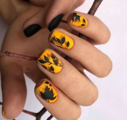Dessins d'ongles d'automne noirs et jaunes