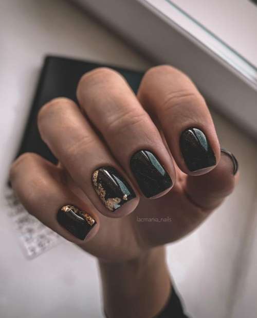 Black manicure with foil