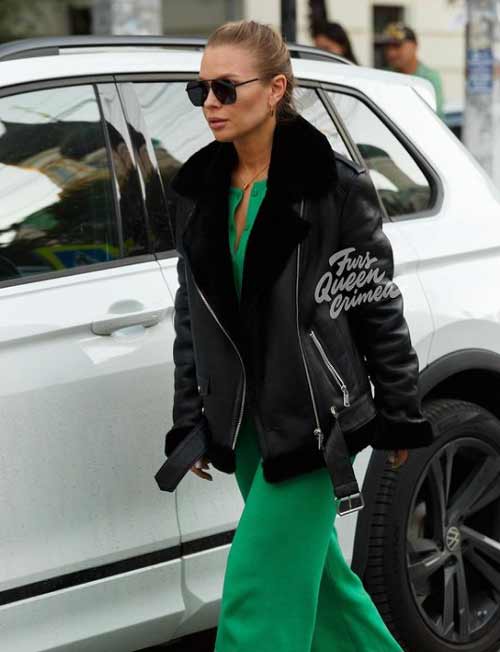 Fashionable sheepskin coat aviator with green suit