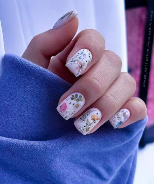 White manicure with a pattern photo