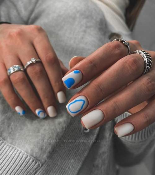 White short manicure with designs