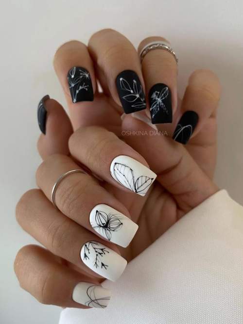 Drawings on white nails